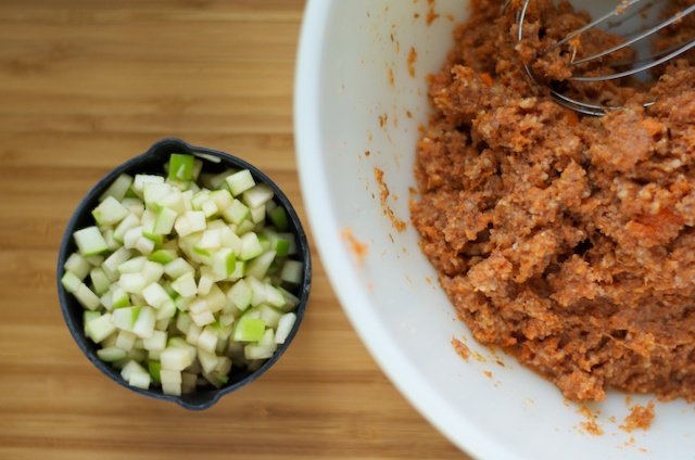 mixing apple into wet and dry ingredients