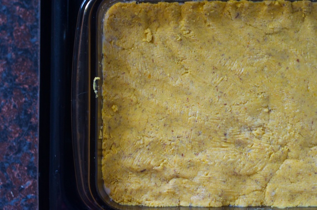 dough pressed into baking dish