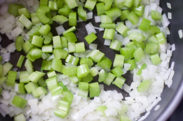 onion and celery sauteeing in skillet