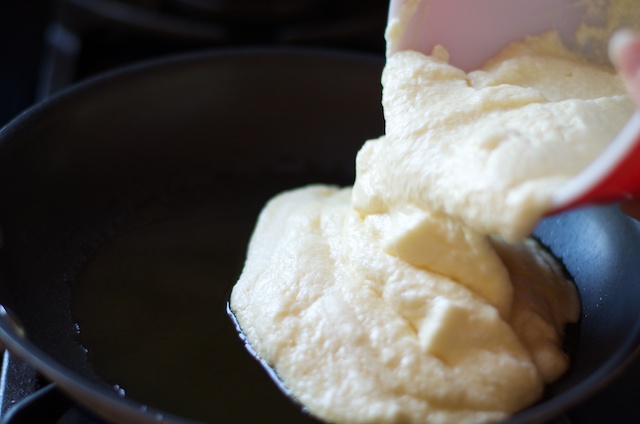 omelette mixture going into skillet