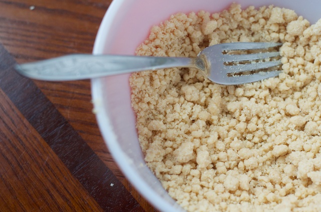 crumbled pie crust ready to be pressed