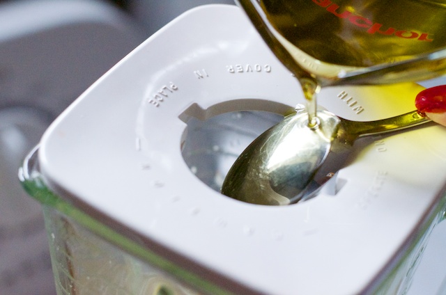 pouring-oil-to-make-mayonnaise